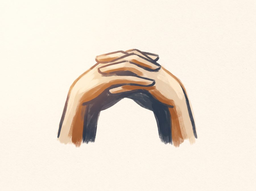 Two hands forming a steady arch