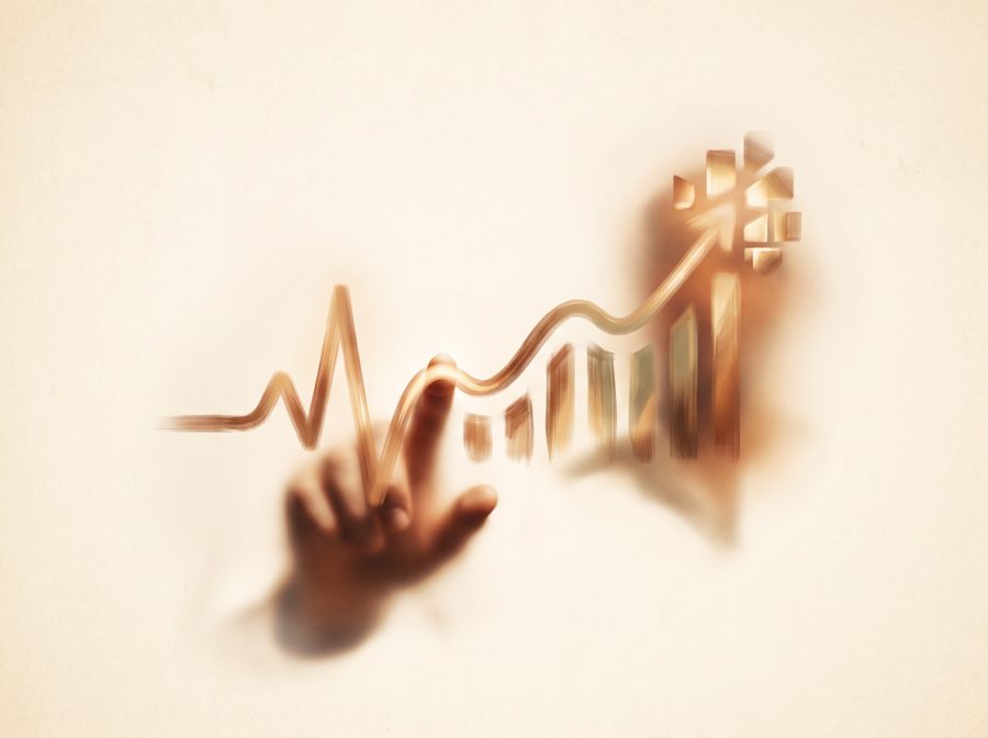A fingertip tracing a rising pulse line
